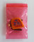 ピンク色の帯電防止プラスチック ジッパー ロック包装袋の再販可能空気堅く サプライヤー